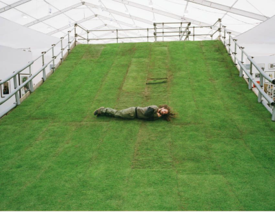 Paola Pivi: Untitled (slope), 2003, grass, wood, and scaffolding, 16.4 by 22.11 by 41.0 feet, at Frieze London.