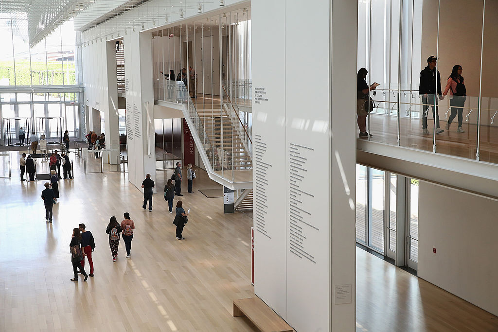 CHICAGO, IL - SEPTEMBER 17: Visitors walk through the Kenneth and Anne Griffin Court in the Modern Wing at the Art Institute of Chicago on September 17, 2014 in Chicago, Illinois. The museum, which draws around1.5 million visitors a year, has been named the best museum in the world by TripAdvisor. The museum has nearly 1 million square feet of exhibit space and 300,000 pieces of art in its permanent collection. (Photo by Scott Olson/Getty Images)