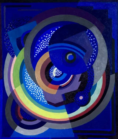 An abstract painting showing intersecting circles in many colors amid a deep blue background.