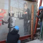 Workers prepare Banksy