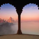 The Taj Mahal seen through arches.