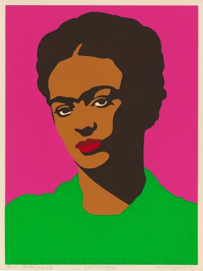 A silkscreen image of Frida Kahlo on a pink background with a green shirt. 