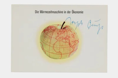 A print showing an apple whose skin shows a map of the world. Above the glowing apple, there is text reading 