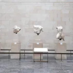 Five marble statues of busts.