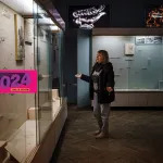 Olga Honcharova, temporary director of the Kherson Regional Museum, shows shows an empty glass display cases in Kherson.