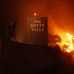 The Getty Villa art museum is threatened by the flames of the wind-driven Palisades Fire in Pacific Palisades, California, January 7, 2025. A fast-moving brushfire in a Los Angeles suburb burned buildings and sparked evacuations Tuesday as 