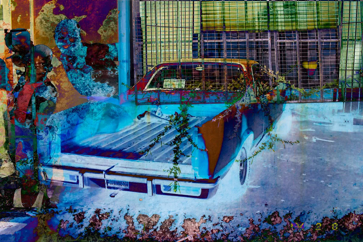 A composite photograph that has its colorization reversed showing a car parked in front of a building.