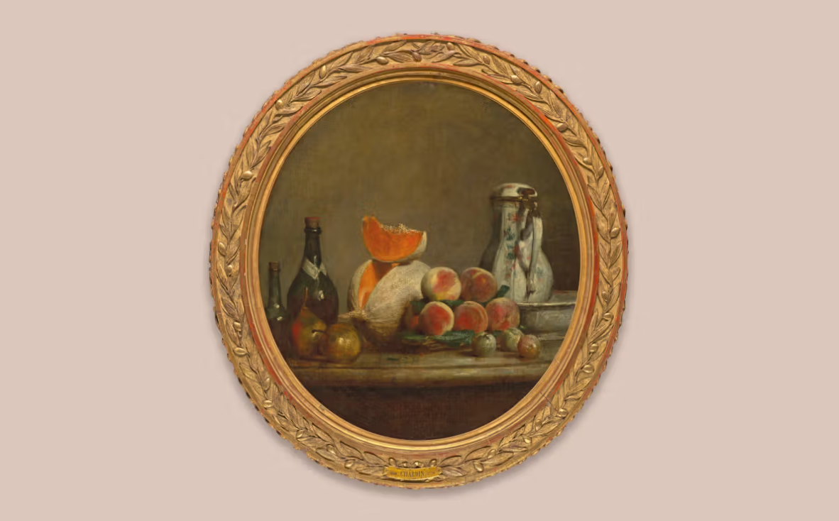 An oval still life painting showing fruit.